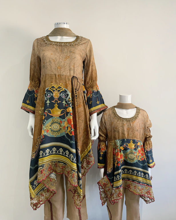 Premium Gold Silk Girls Embezzled Frock Suit